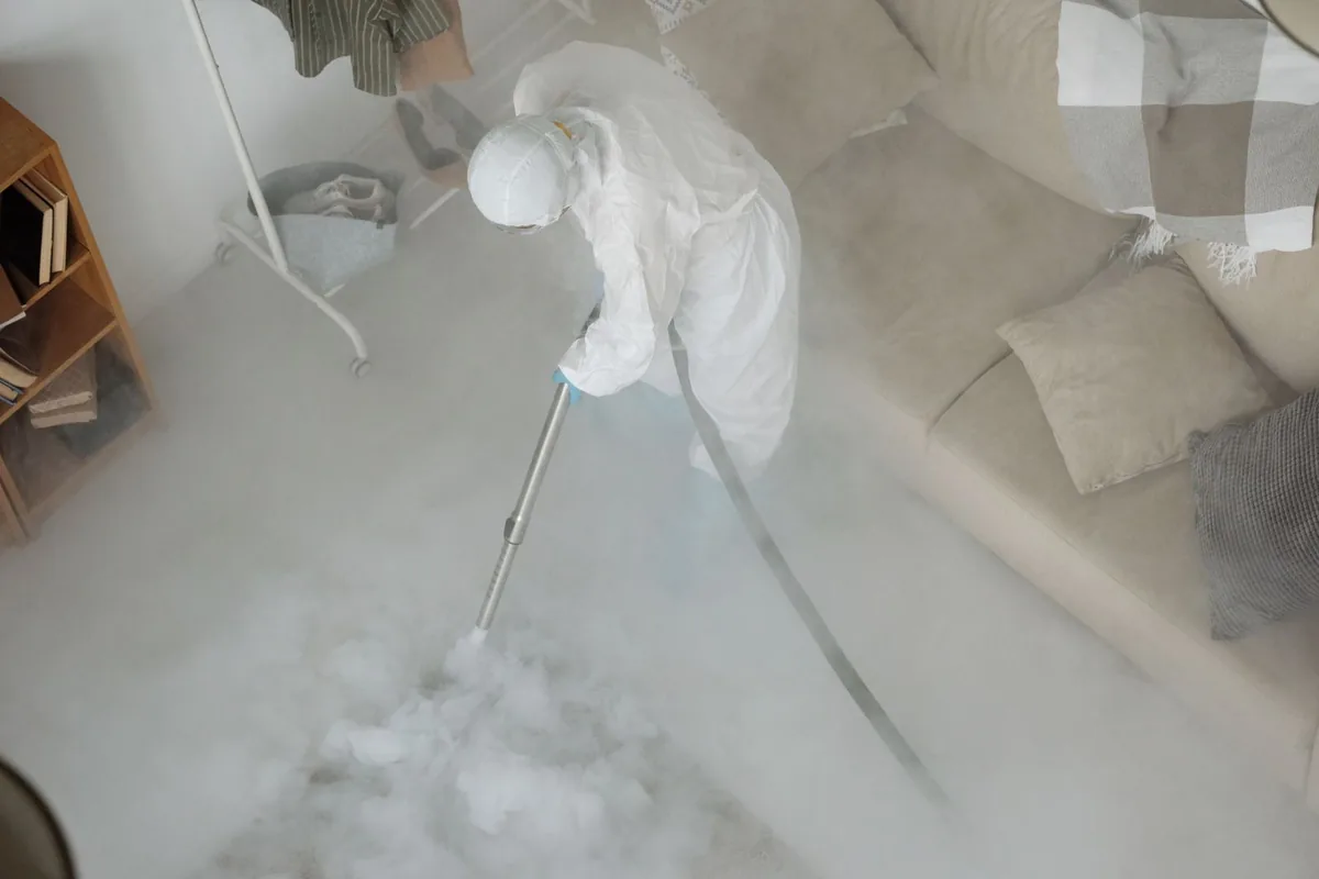 Biohazard cleanup technician in protective equipment, Manheim, PA